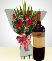 Regalos de Lujo - Combo Distinción: Bouquet de 12 Rosas + Vino.